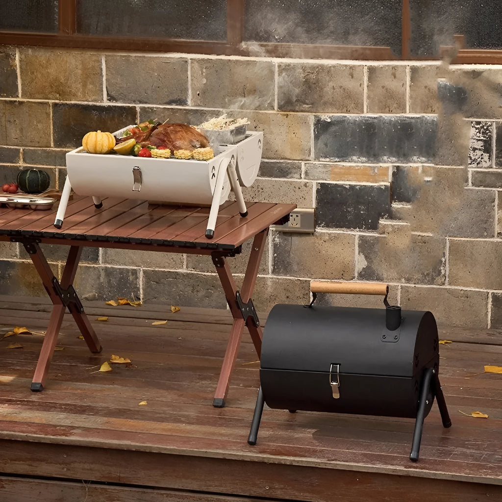 White round portable charcoal barbecue grill with folding design and detachable components