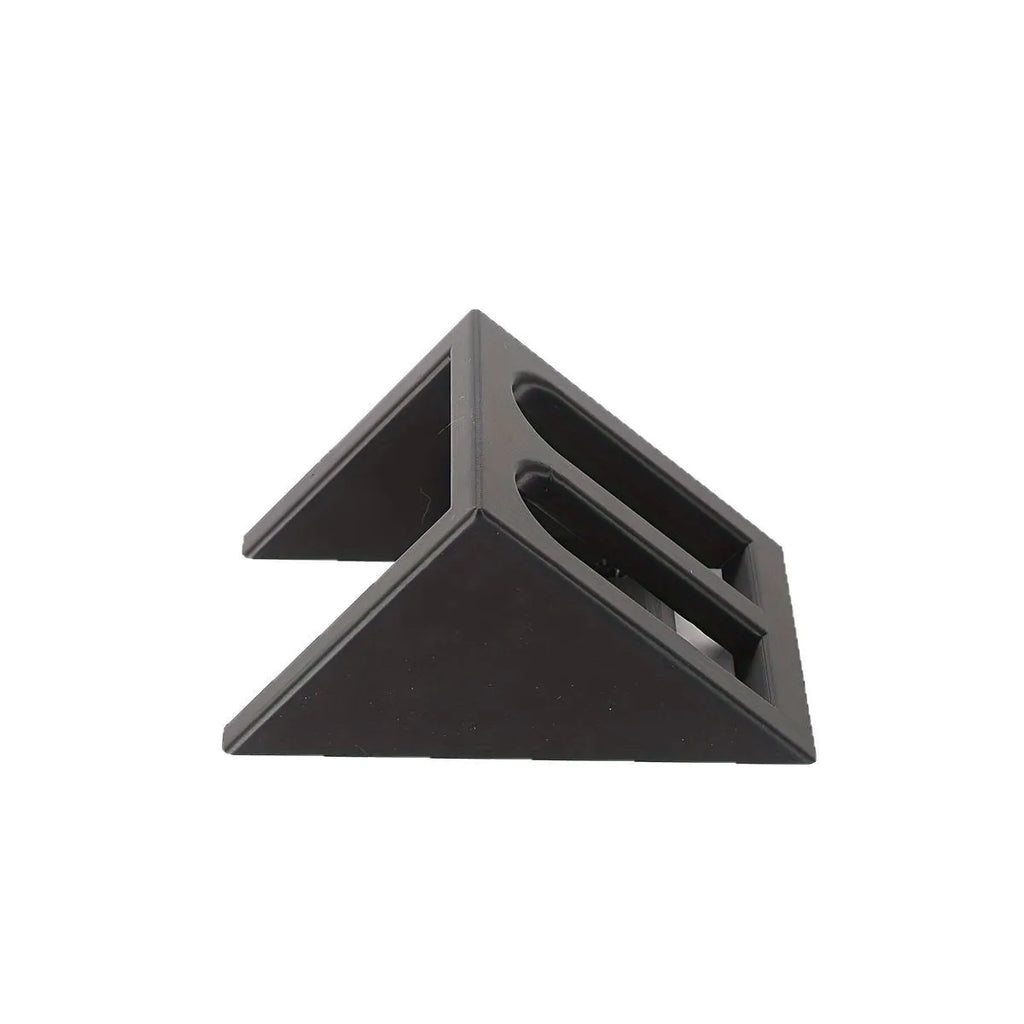 Black punk-style plastic pistol display stand measuring 10.85cm by 7.6cm