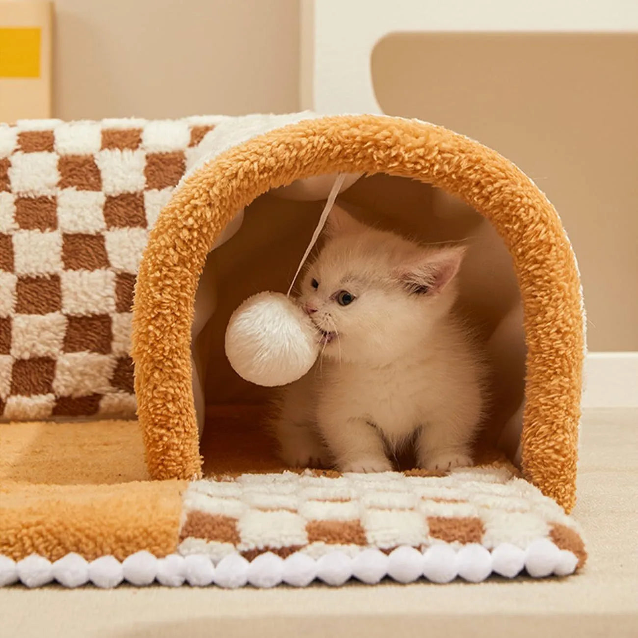 XL fan-shaped plush pet bed for dogs and cats with integrated tunnel in a plaid pattern.