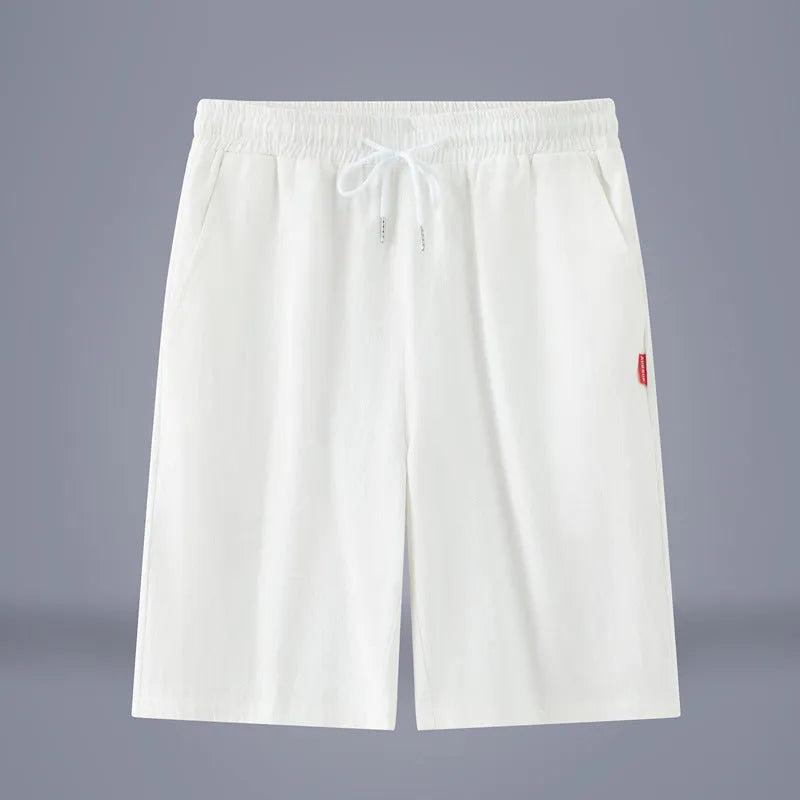 Cotton and linen cropped trousers in solid colours with a drawstring mid-waist