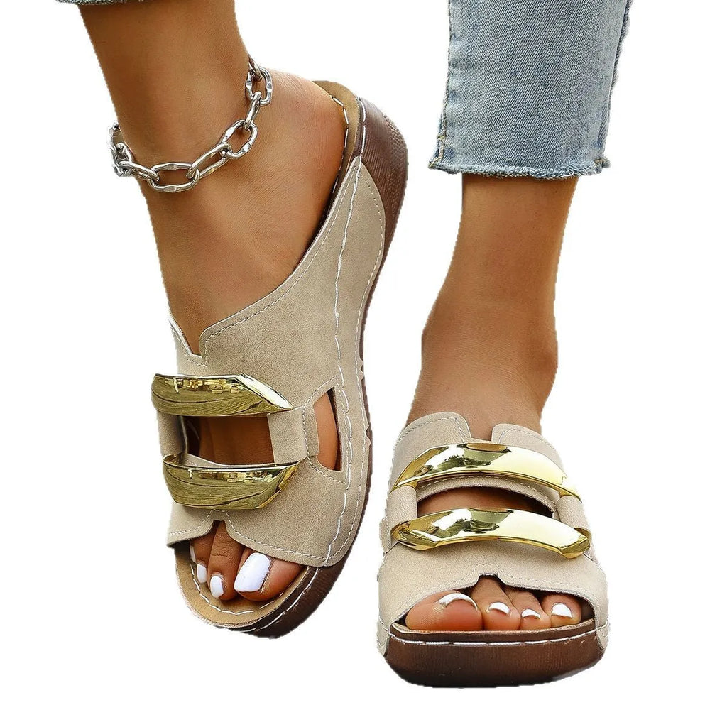 Adult Roman style platform sandals in a solid colour with a strap design and flat rubber sole.