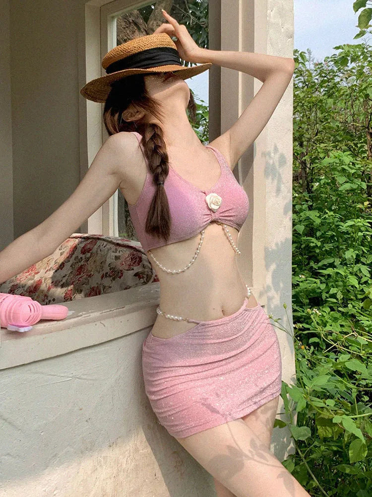 Women's pink and black polyester three-piece bikini swimsuit with high elasticity construction