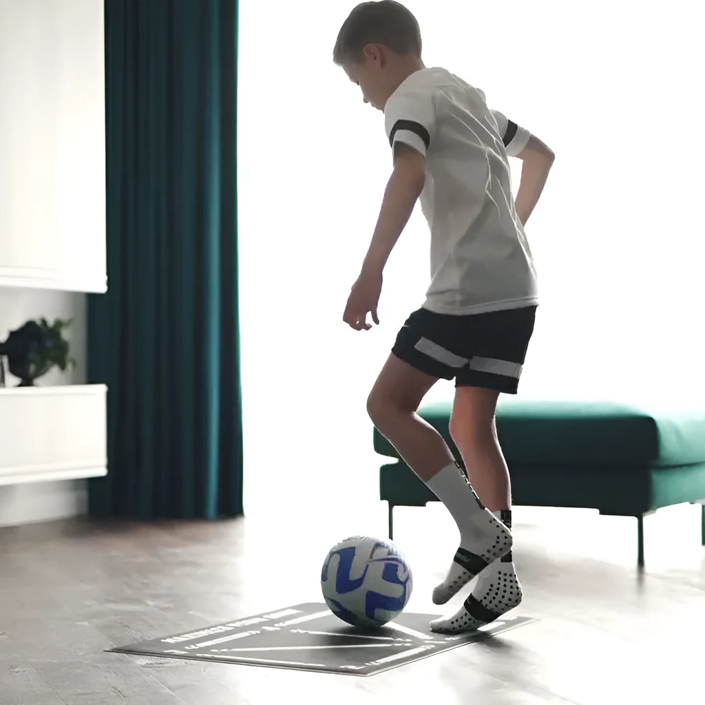 Black football training mat measuring 60x90 cm for non-slip practice