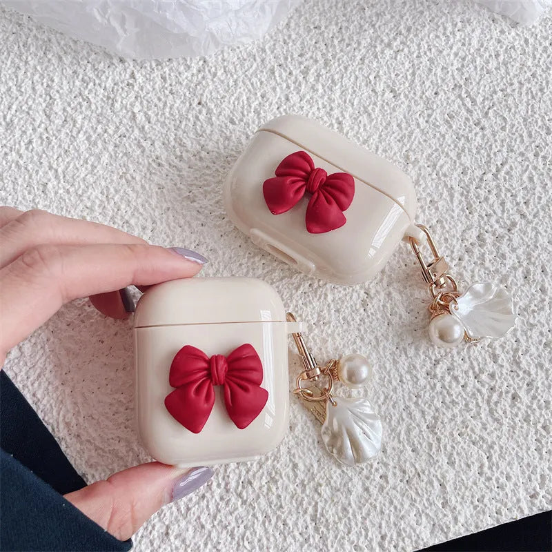 Beige red bow shell wireless earphone case for AirPods with clamshell design