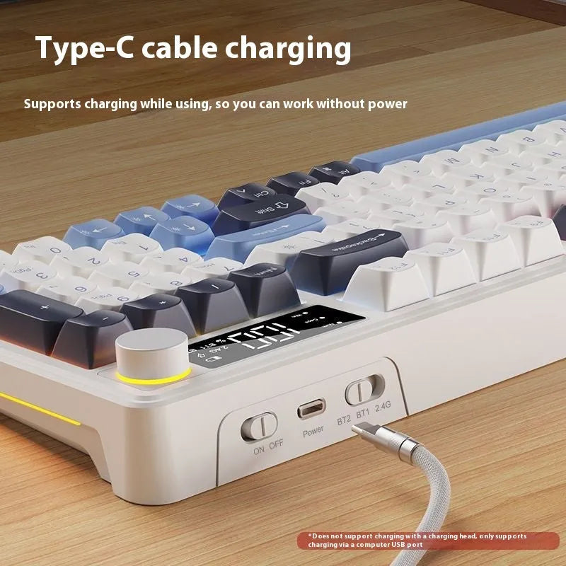 Blue and white wireless mechanical keyboard and mouse set on a desk, showing Type-C cable.