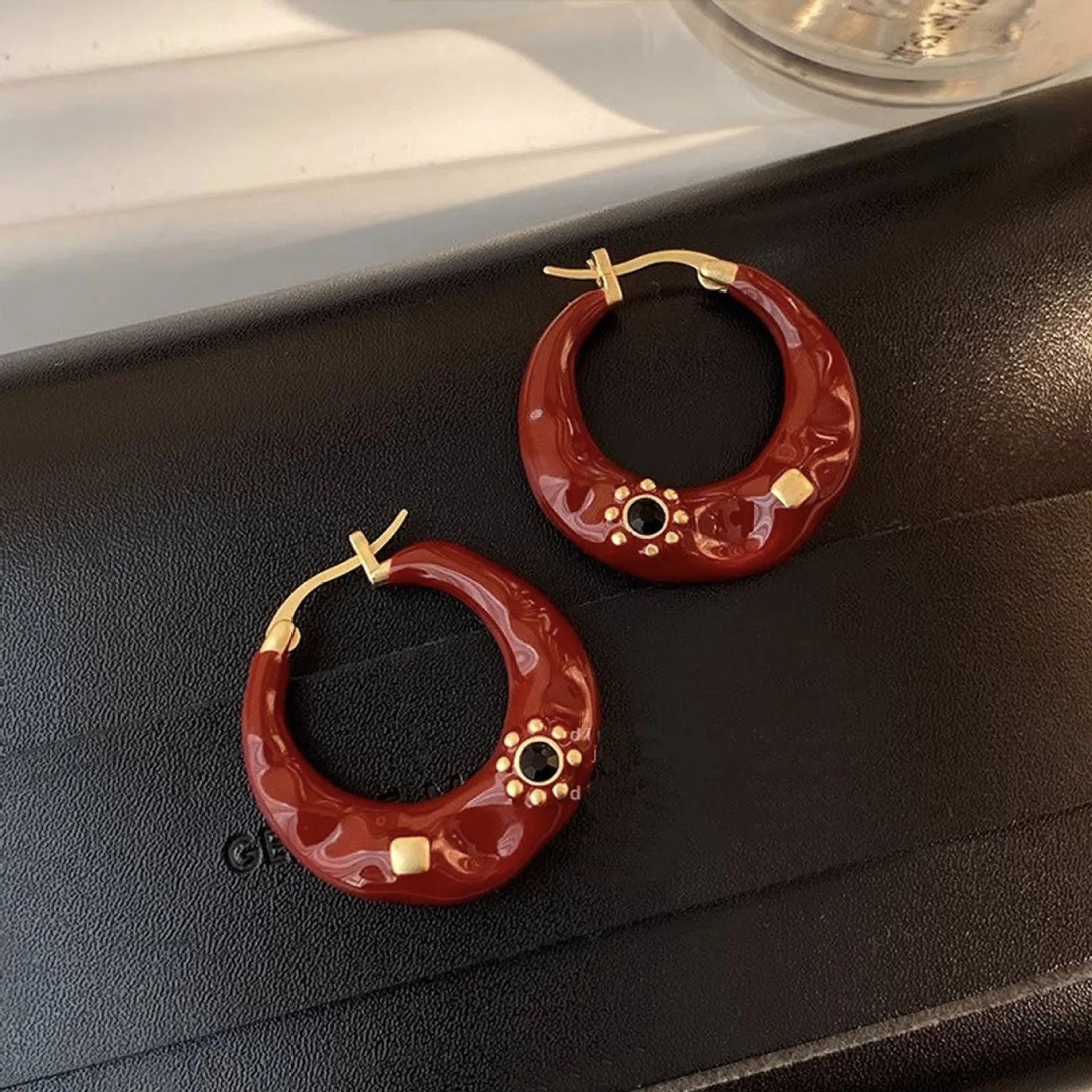 Retro style alloy ear studs with rhinestone decoration in black and red colours