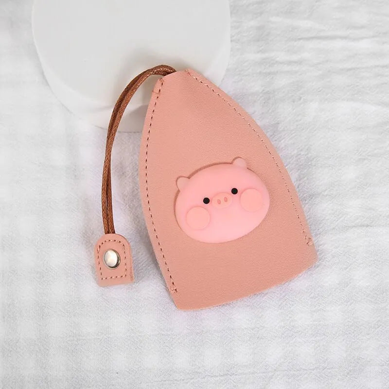 Cartoon pull-out key case in PU leather with colourful design, showing compact 14cm by 7.5cm dimensions