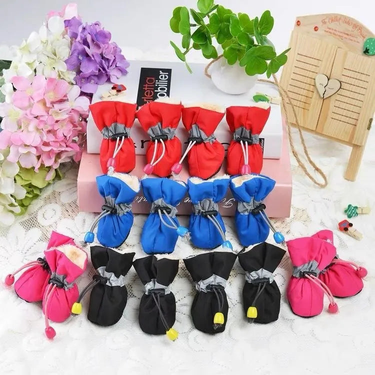 Soft sole cloth dog shoes showing multiple colour options including fleece-lined and monkey print designs