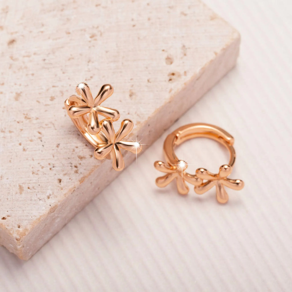 Rose gold electroplated waterdrop flower earrings with circular geometric shape