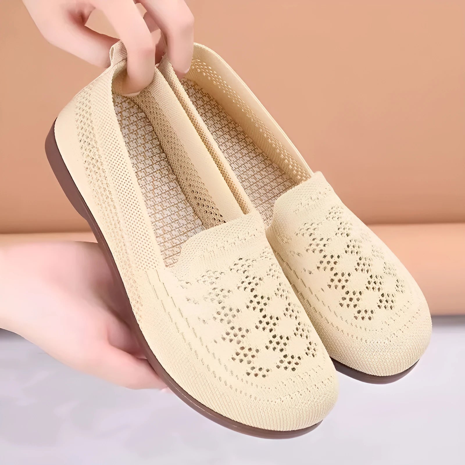 Beige women's low-top mesh casual shoes with a round toe and lightweight PVC sole.