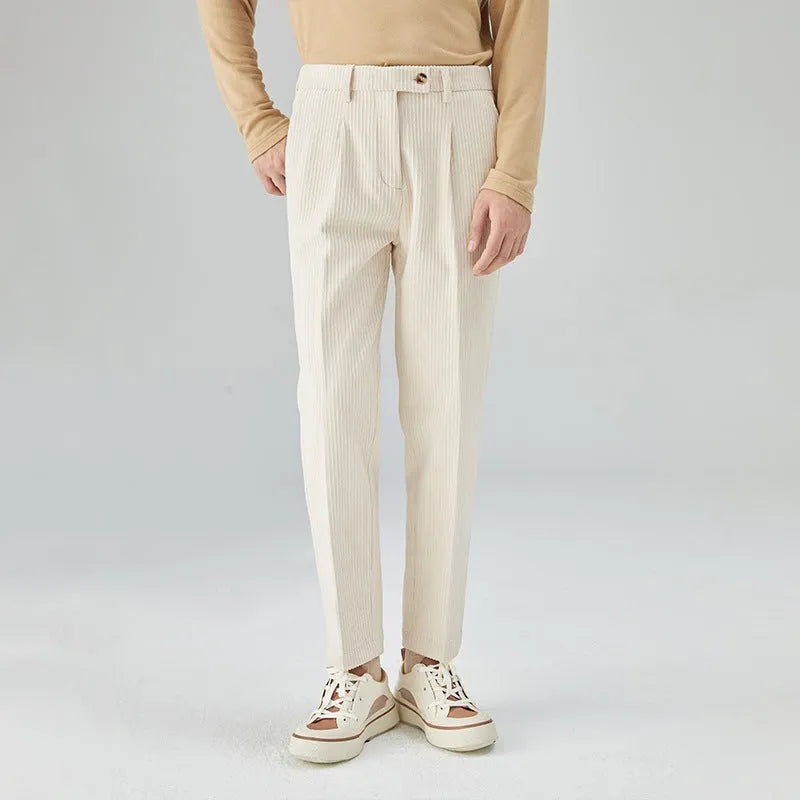 Men's straight-leg corduroy trousers in beige colour showing front view with mid-waist design