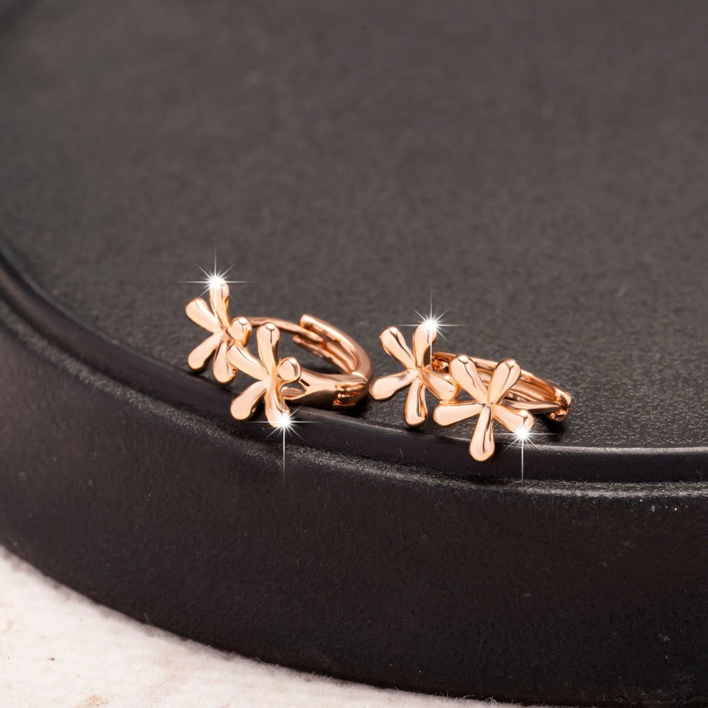Rose gold electroplated waterdrop flower earrings with circular geometric shape