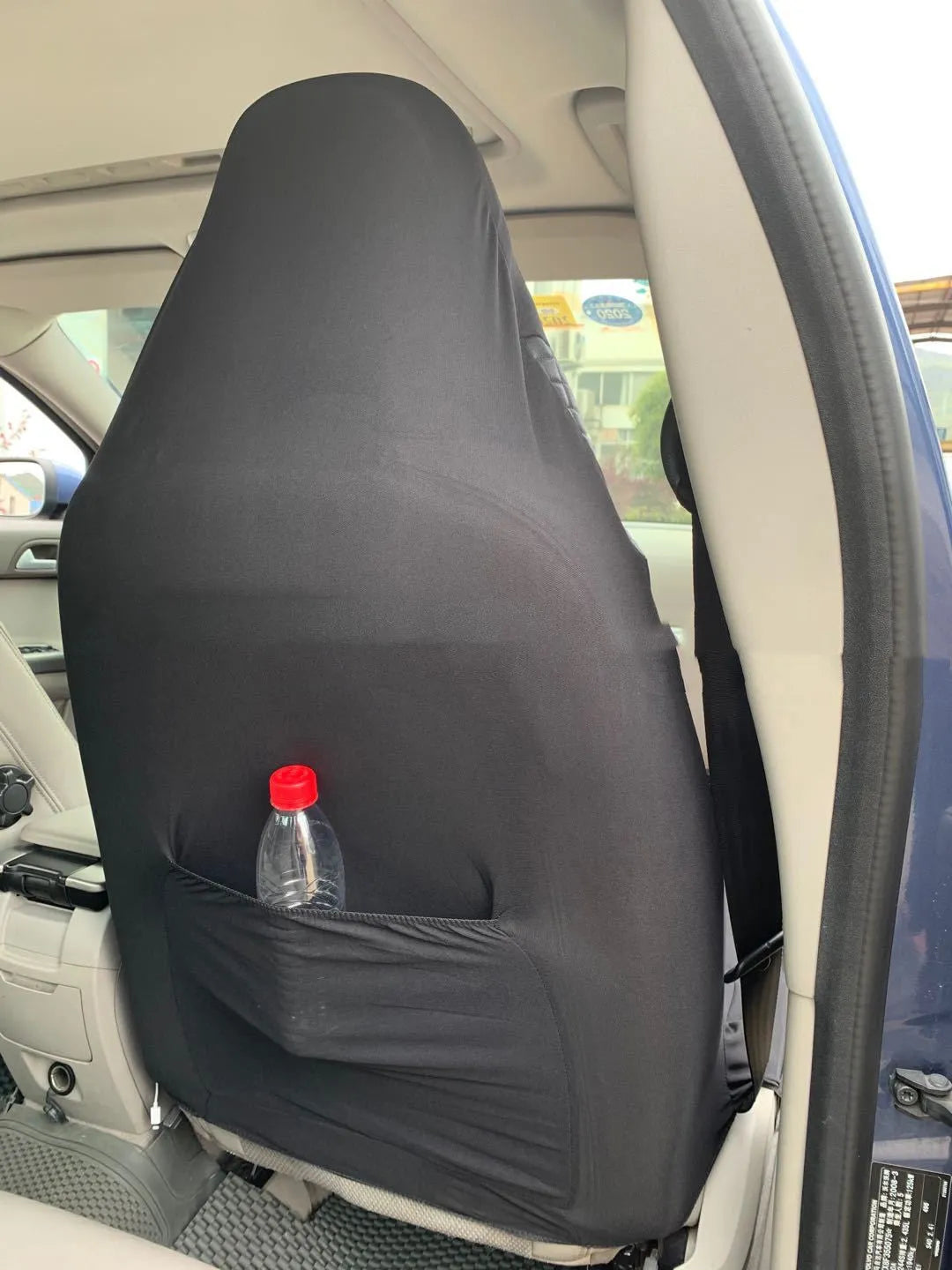 Black quilted universal car seat cover made of PU and polyester fabric