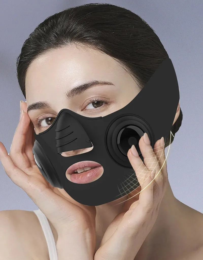 Black wearable photon therapy face mask beauty device with a USB charging port.