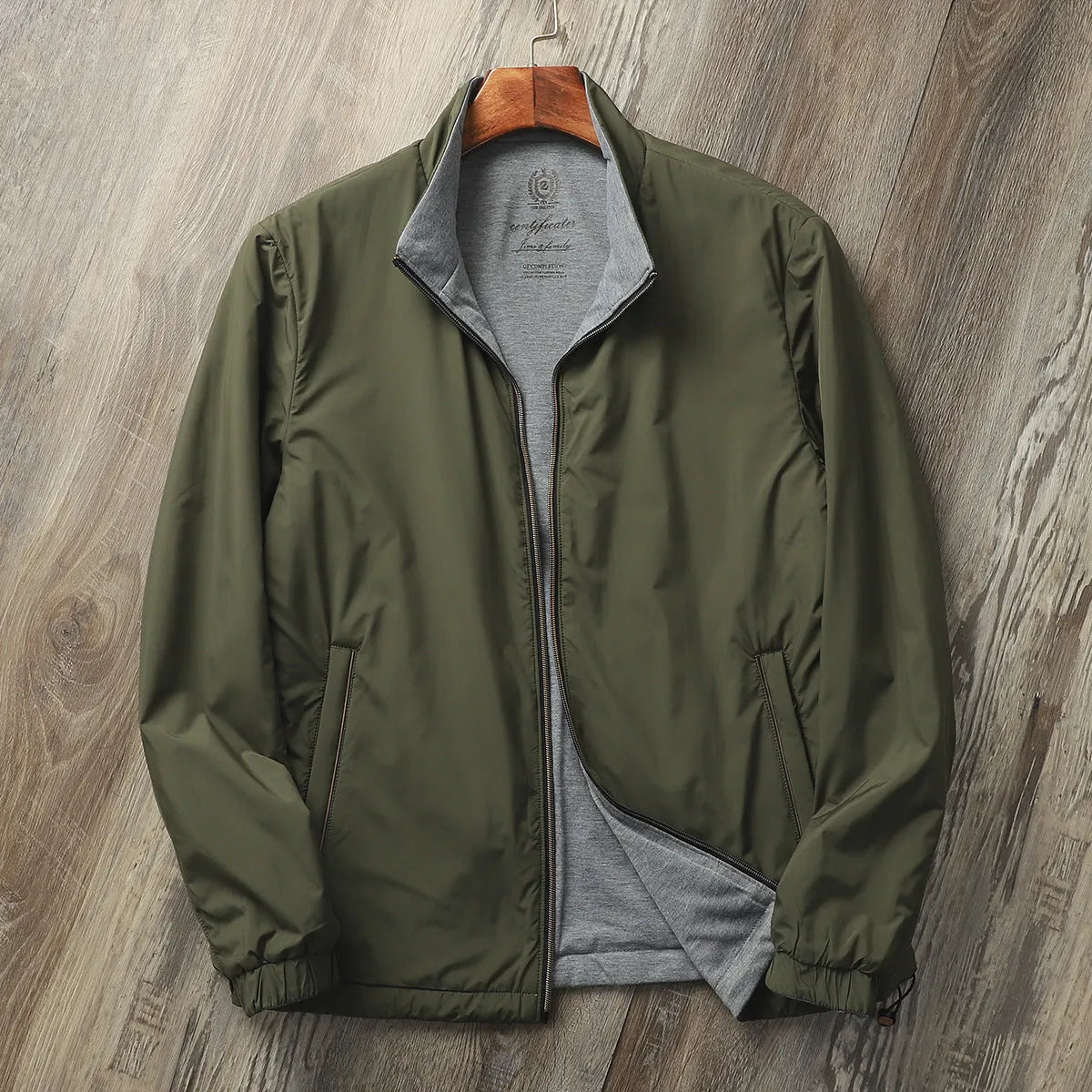 Men's stand collar casual jacket in polyester blend fabric with cotton lining