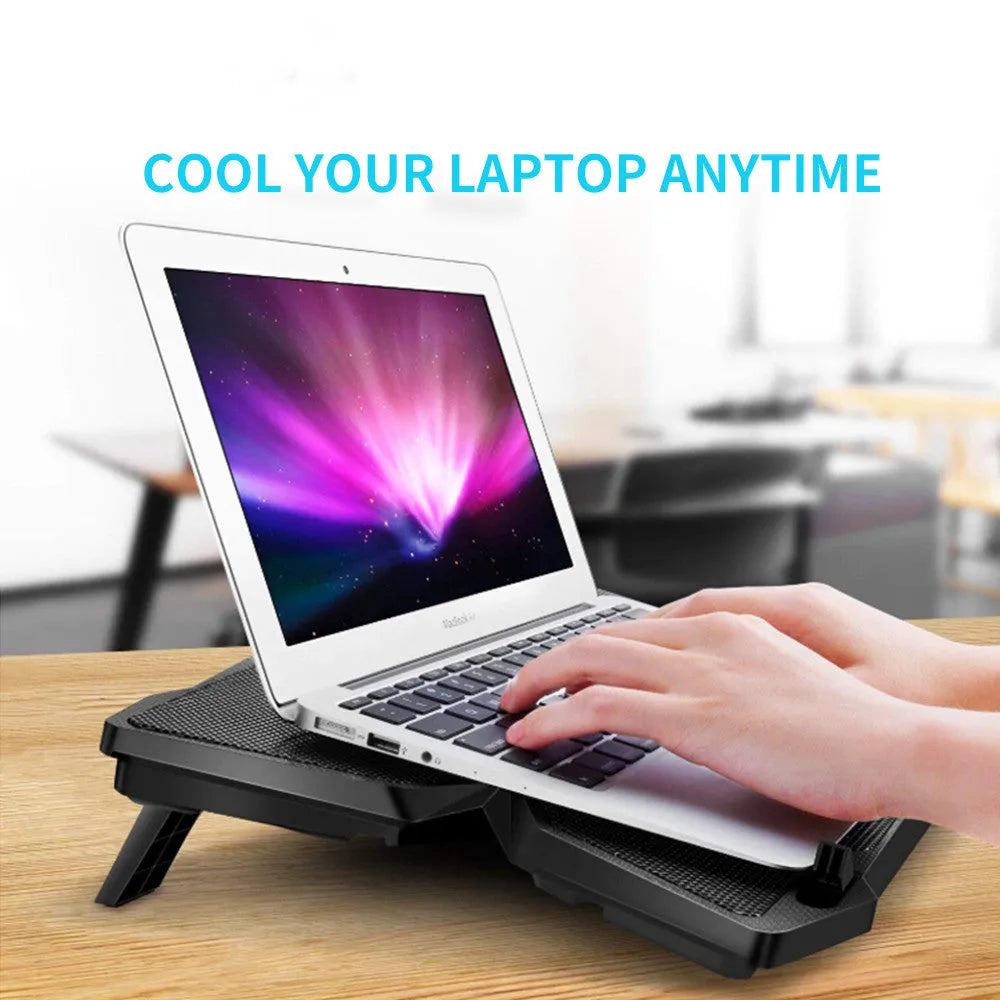 Blue computer cooling base with four LED fans and USB ports for desktop temperature management