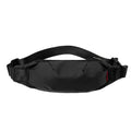 Black Oxford cloth crossbody waist pack showing front zipper and strap