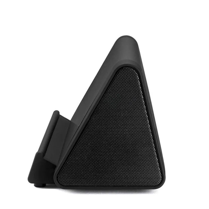 Black and white wireless mini Bluetooth speaker with charging cable