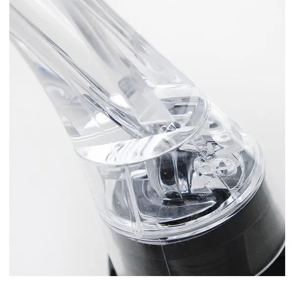 Clear acrylic wine aerator with stainless steel filter, 16cm long.