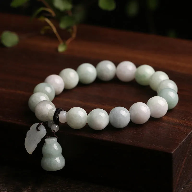 Natural emerald jade bracelet with geometric Maitreya Buddha pendant in adjustable design