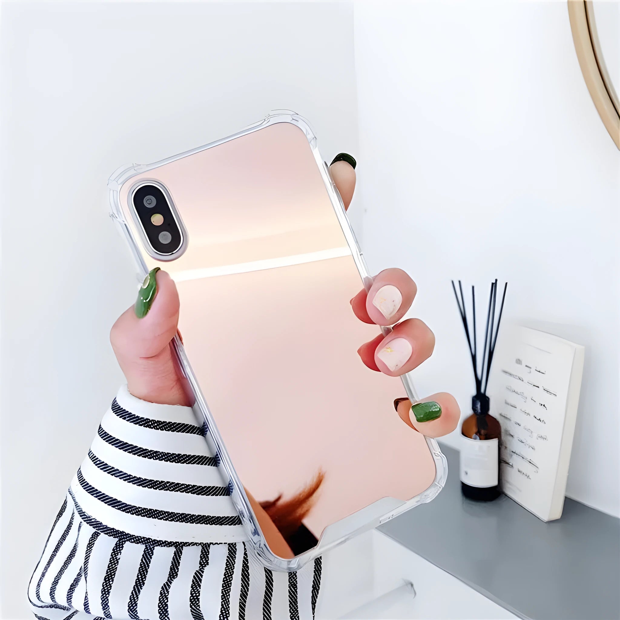 Mirror finish TPU protective case shown on iPhone with colour options displayed.