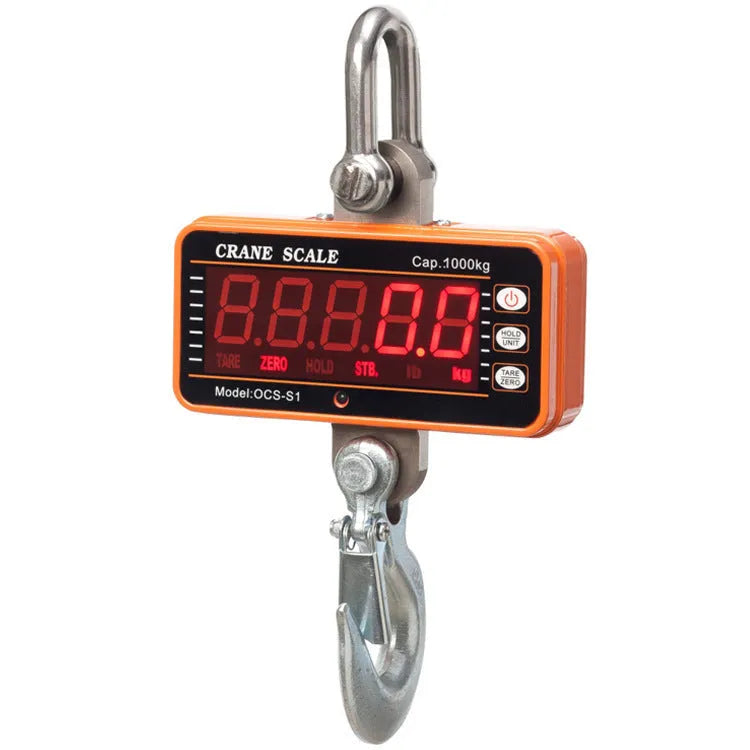 Orange electronic crane scale with direct digital display rated for 500kg load in warehouse