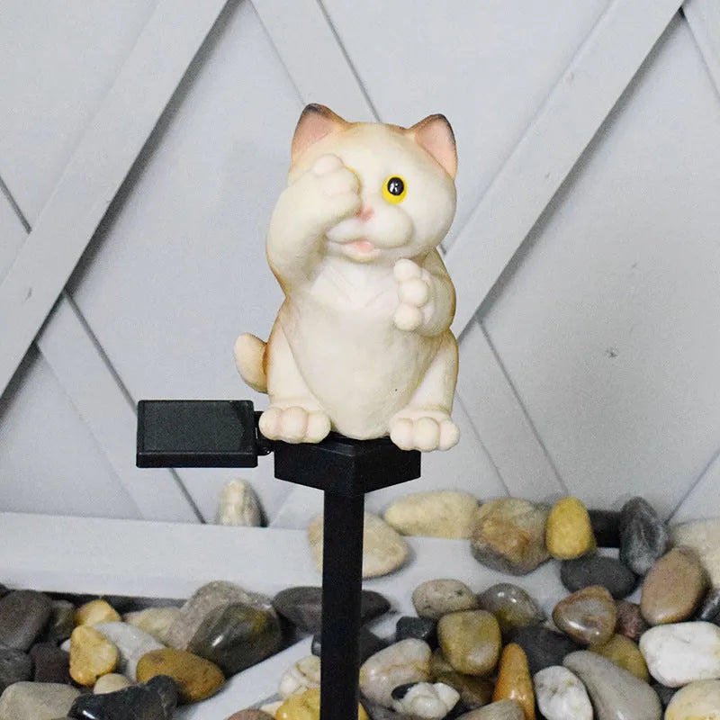 Brown cat-shaped solar lawn light for garden decoration with solar panel and LED illumination