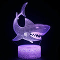 3D shark design LED table lamp with colourful lighting and remote control on wooden desk