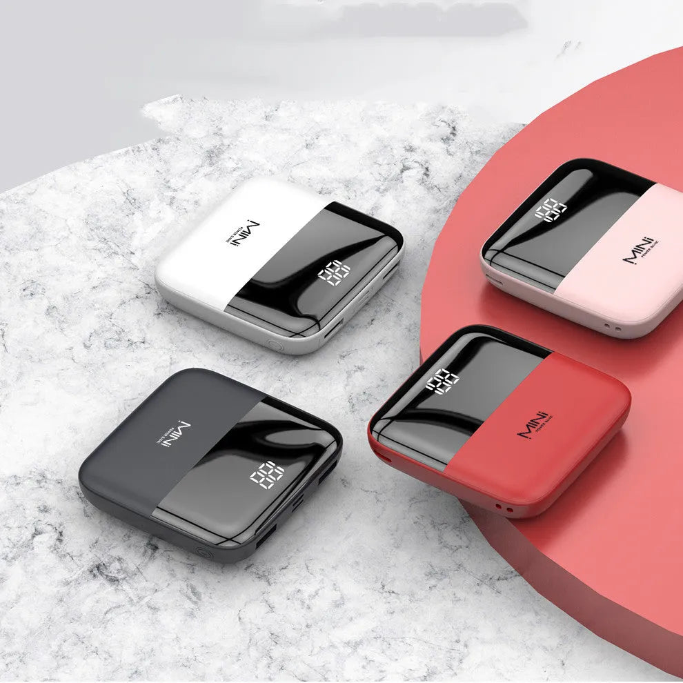 10000mAh portable power bank with digital display showing battery percentage and dual USB ports