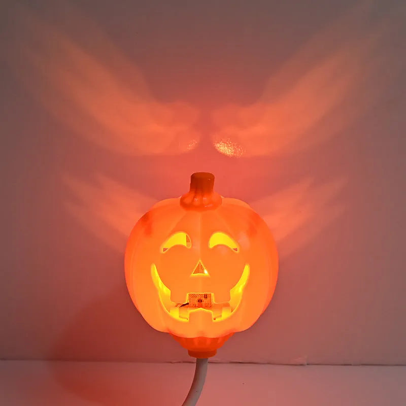Plastic pumpkin decorative lamp with USB charging cable and yellow or purple light options