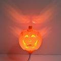 Plastic pumpkin decorative lamp with USB charging cable and yellow or purple light options