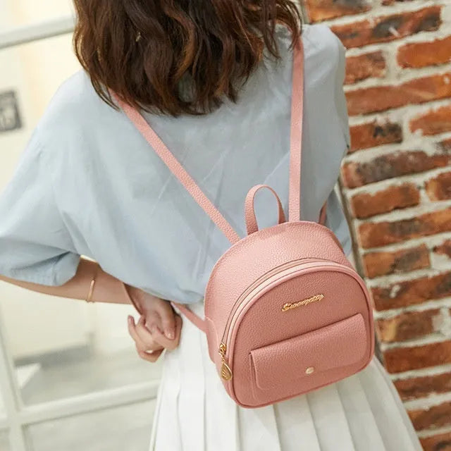 Women's black PU shoulder bag backpack compact letter purse with zipper closure