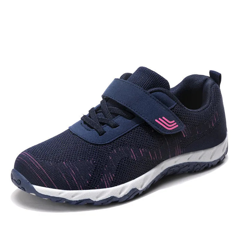 Women's low-top grey purple wedge heel shoes with velcro strap and breathable mesh upper.