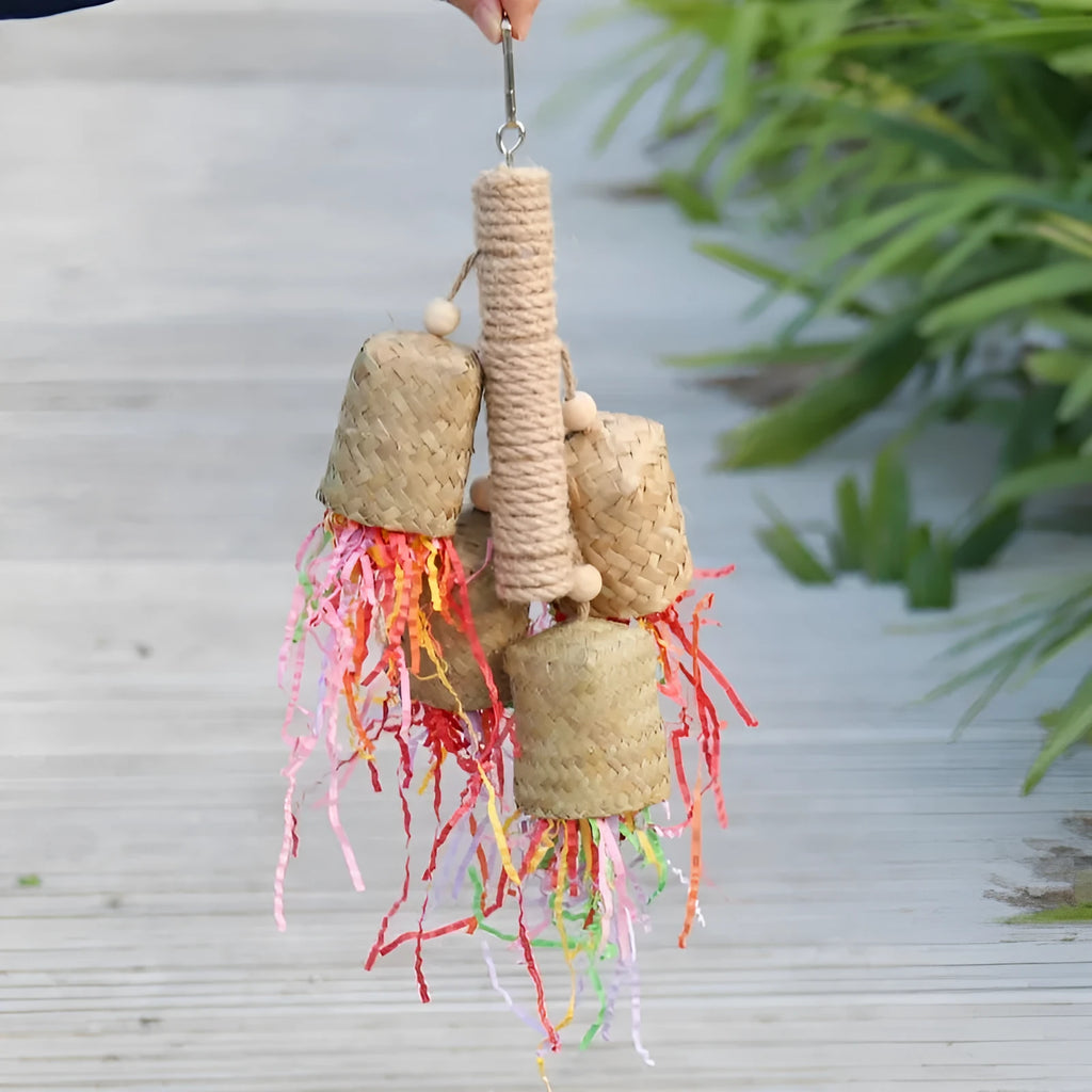 Wood and sisal shredded paper hanging toy for parrots measuring 15 by 35 centimetres