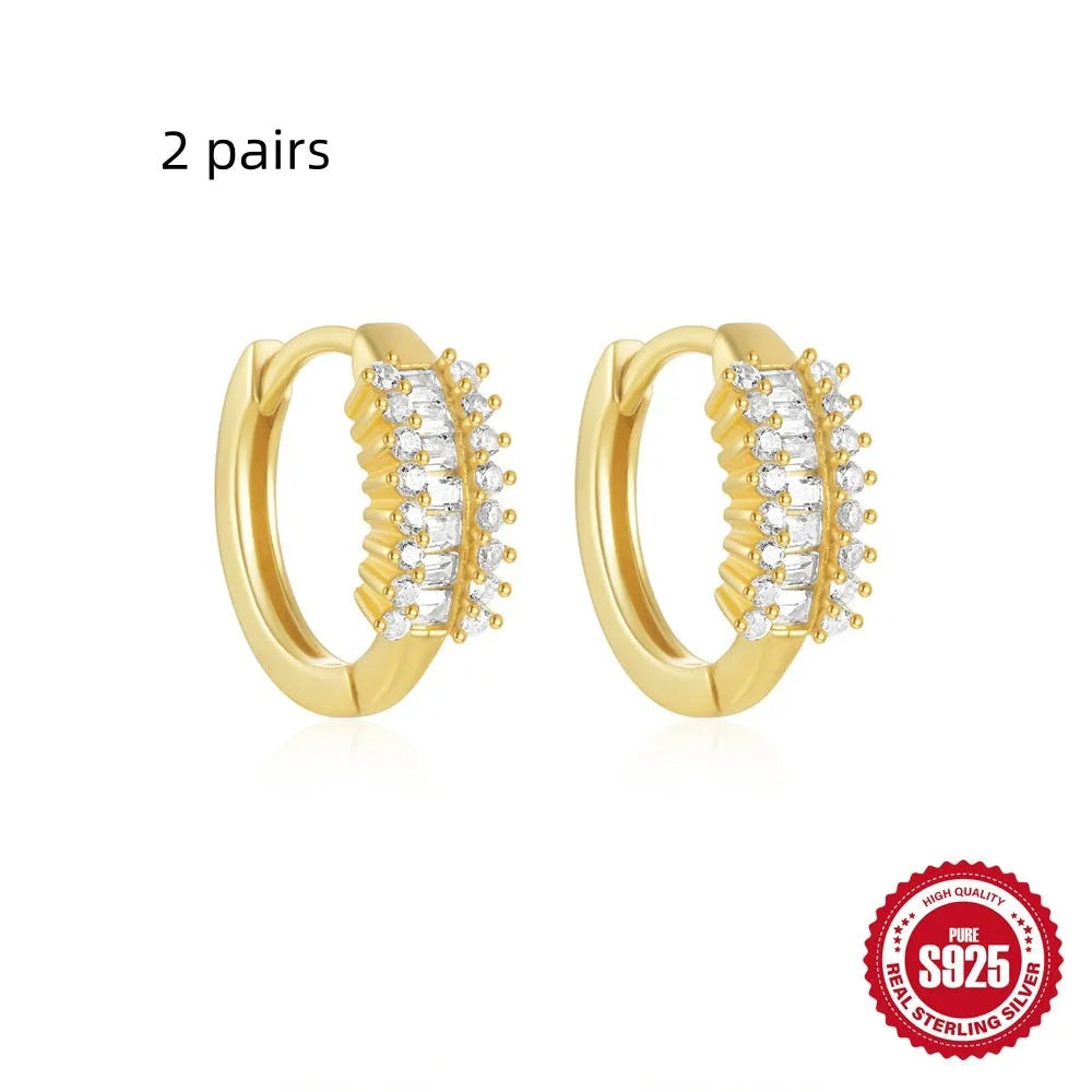 Sterling silver geometric stud earrings with small round diamond accent in gold or silver finish