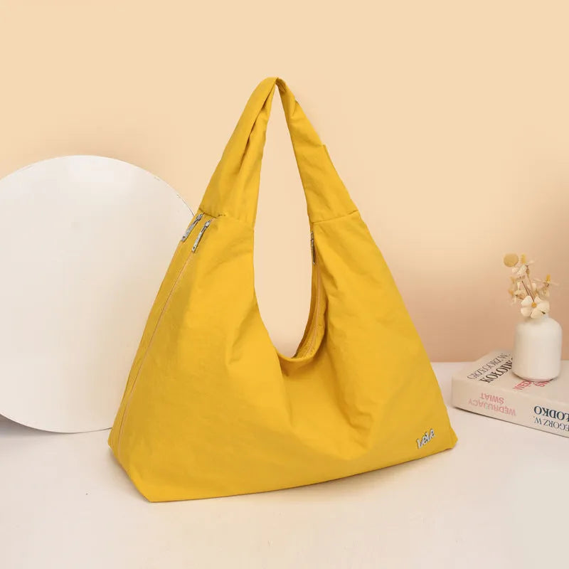 Heart-shaped nylon underarm bag with detachable shoulder strap in four colour options