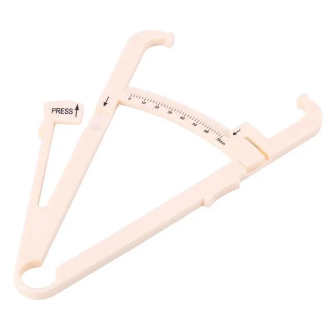 Clear acrylic body fat caliper showing measurement scales for skin fold thickness assessment