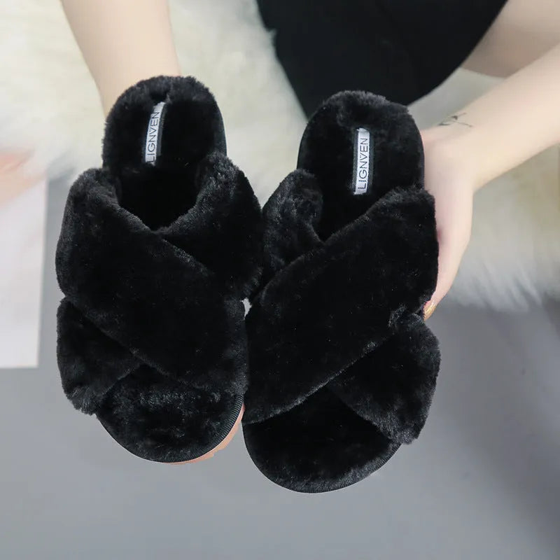 Women's black cross open-toe fur slippers with a patterned anti-slip sole.
