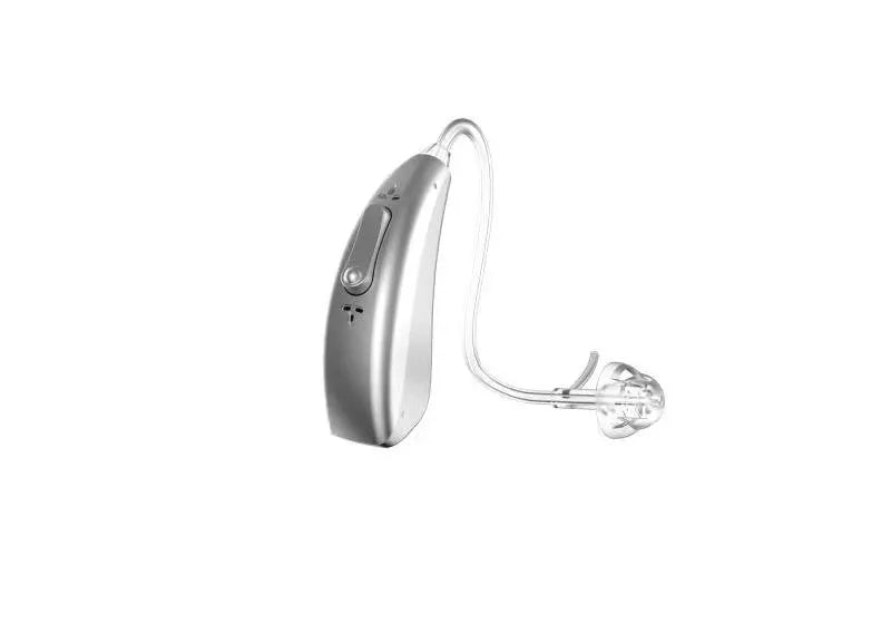 Rechargeable invisible hearing aid and USB charging case on a table.