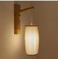Natural bamboo plait wall light with E27 holder measuring 15cm diameter and 35cm height for hallway decoration