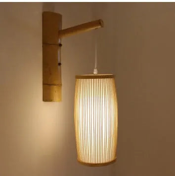 Natural bamboo plait wall light with E27 holder measuring 15cm diameter and 35cm height for hallway decoration