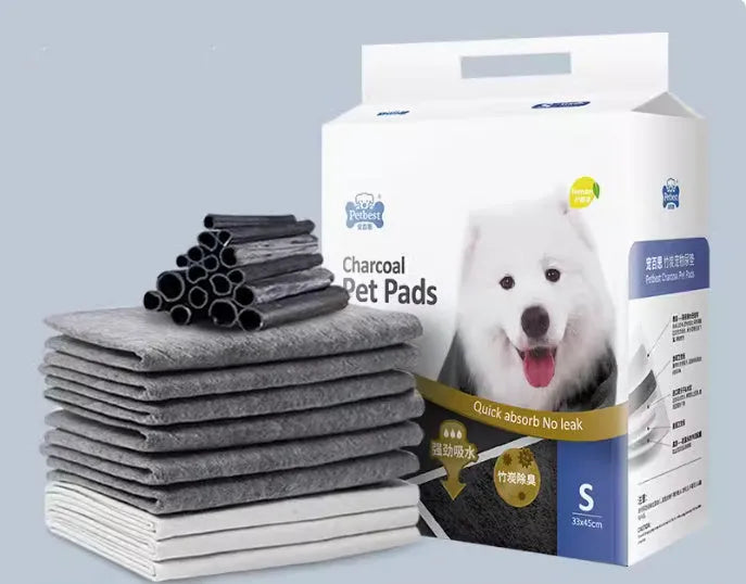 Pack of dog urine pads showing adhesive backing, bamboo charcoal variant, and size comparison