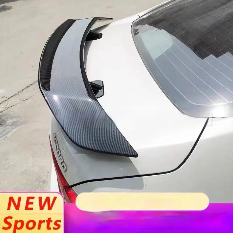 Punch-free adhesive mount car spoiler in ABS plastic, shown in carbon pattern finish.