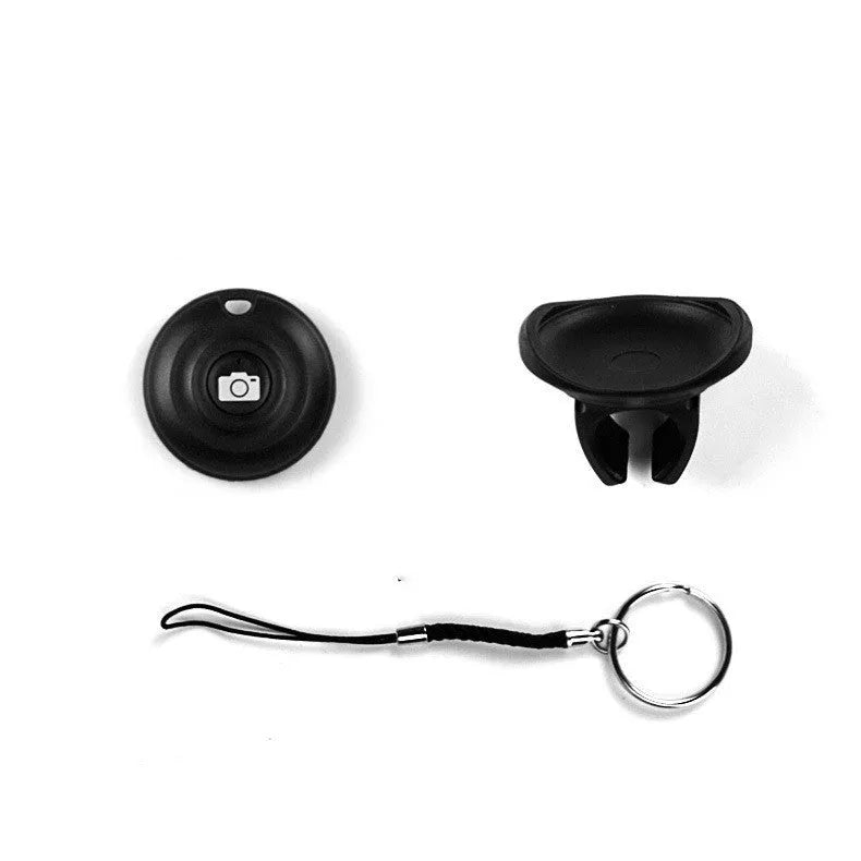 Black snap-on Bluetooth remote control for wireless smartphone camera shutter.