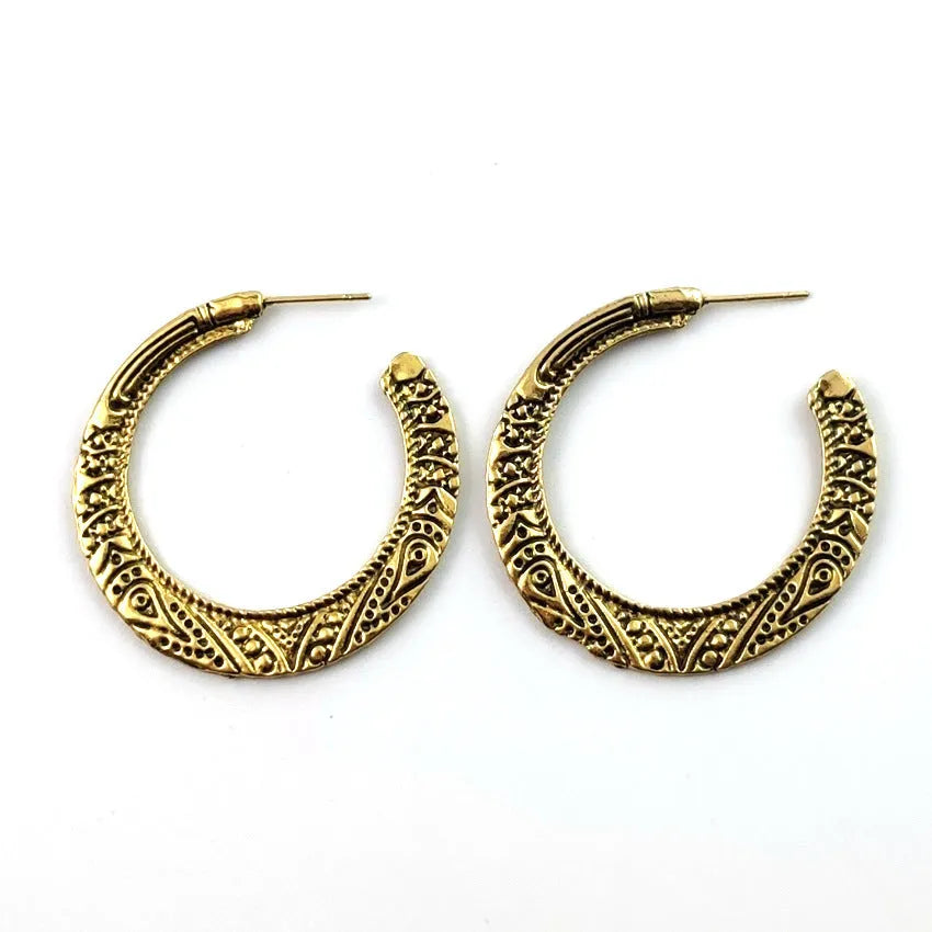Vintage engraved C-shaped alloy earrings in bronze finish with detailed surface patterns