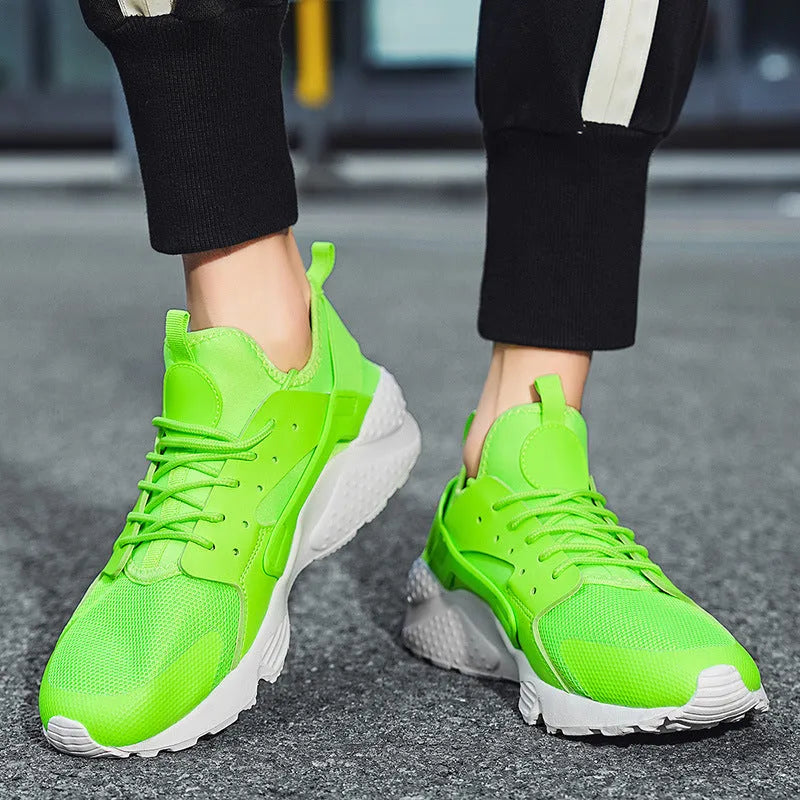 Men's low top casual shoes with cross strap design and mesh construction in fluorescent colours