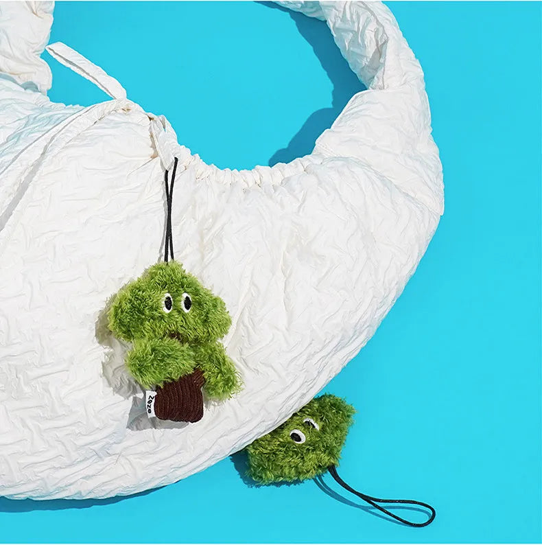 Pine tree shaped cat mint toy with hanging loop in three sizes for biting and grinding