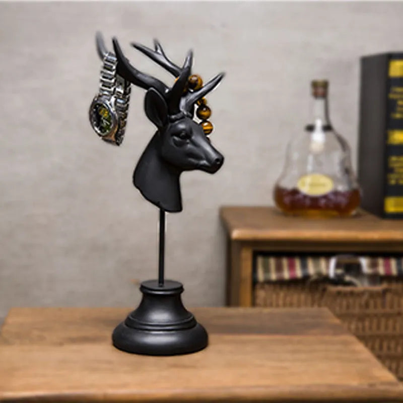 Natural resin animal figurine home decoration in black, white, or wood colour finish.