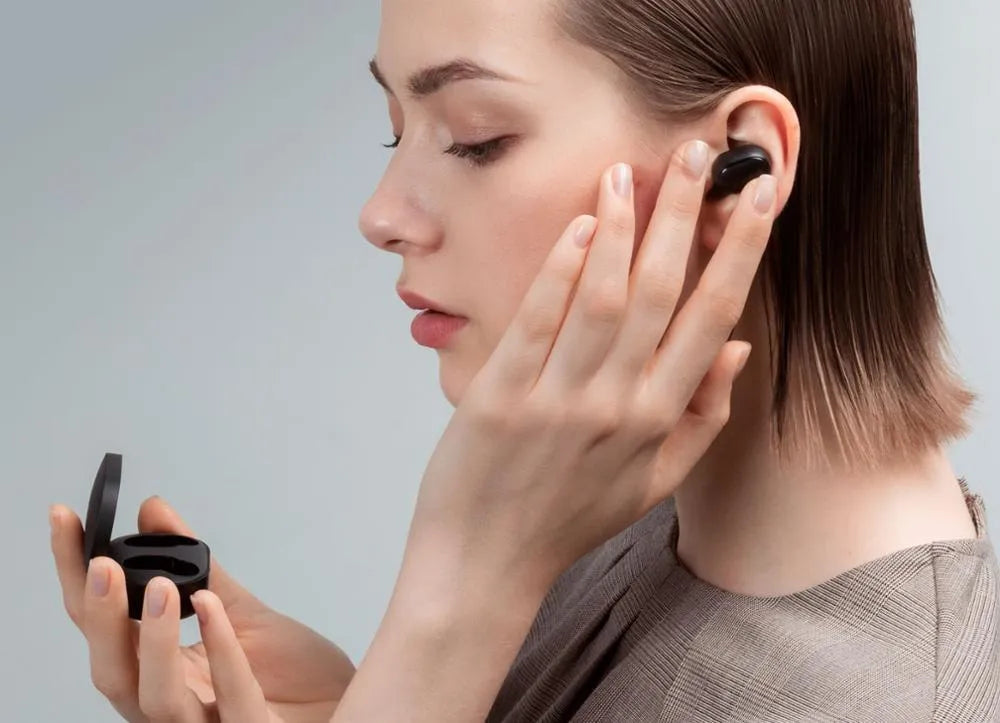 Redmi AirDots 2 black true wireless Bluetooth earbuds and charging case.