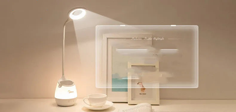 Green, pink, and white USB rechargeable table lamp with a touch switch on a wooden desk.
